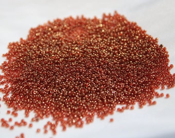 15/0 Gold Lustered African Sunset Toho seed bead, 10 grams, Color# Tr-15-329