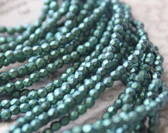 2mm Fire Polish Polychrome Aqua Teal (50 beads) 1 strand