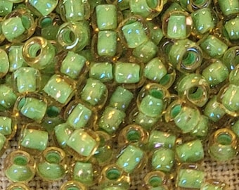 11/0 Green Lined Citrine Transparent Toho seed bead, 15 gram bag, Tr-11-946.