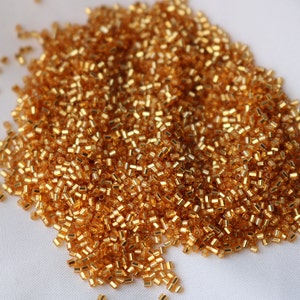 15/0 Cut S/L Dk Gold Miyuki seed bead, 10 gram bag, Color# 15C-4