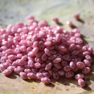 Matubo MiniDuo 4 x 2mm  2 hole bead: 10 gram bag,  Luster - Opaque Soft Pink, P14494