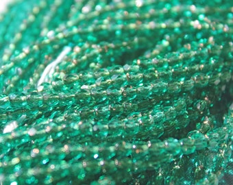 3mm Fire Polish Emerald Copper Lined Czech Glass beads (100 beads) 2 strands.