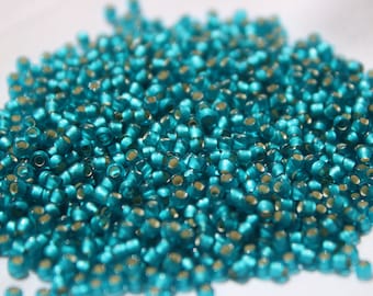 8/0 Light Green Aqua Silver Lined Matte Toho seed bead, 15-gram bag, TR-08-23BDAF.