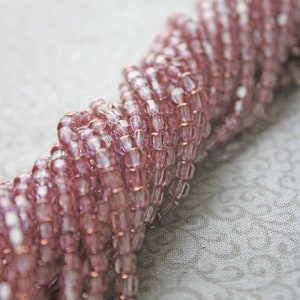 4mm Pink Preciosa Czech Faceted Tube Gold on Pink Catherall cut. (100 beads)