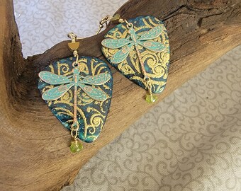 Blue Fender guitar pick earrings with gold design, brass dragonfly stamping.