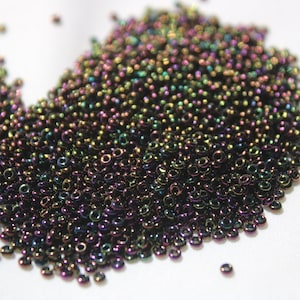 11/0 Demi Round Toho seed bead, 10 gram bag, Purple Iris Metallic, Color # 11-TD-85