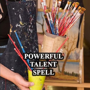 May include: A person holding a yellow cup with paintbrushes in it. The cup is sitting on top of a burlap sack. The person is wearing a black apron with paint splatters on it. The text "POWERFUL TALENT SPELL" is written in red letters on the image.