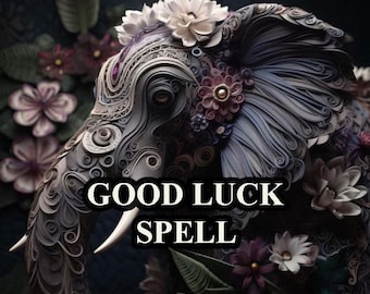 May include: A close-up of a gray elephant sculpture with intricate paper designs and floral accents. The elephant's trunk is curled up and the sculpture is surrounded by flowers. The text "GOOD LUCK SPELL" is written in white letters on a black background.