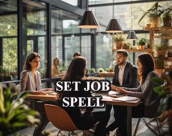 May include: A group of people sitting around a table in a modern office setting. The table is made of wood and has a glass top. The people are all dressed in business casual attire. The text "SET JOB SPELL" is visible on the table.