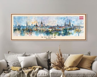 May include: A watercolor painting of the Vienna skyline, featuring the city's iconic landmarks, including the Stephansdom cathedral and the Hofburg Palace. The painting is framed in a light wood frame and includes the text "VIENNA AUSTRIA" and the Austrian flag.