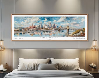 May include: A watercolor painting of the Cincinnati skyline with the Ohio River in the foreground. The painting is framed and hanging on a wall in a bedroom. The text "CINCINNATI OHIO" and "The Blue Chip City" is visible at the bottom of the painting.
