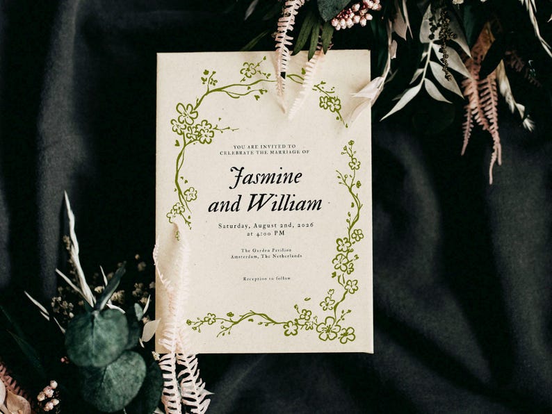 May include: A wedding invitation with the names "Jasmine and William" in elegant script. The invitation is cream-colored with a floral border and includes the date, time, and location of the ceremony.