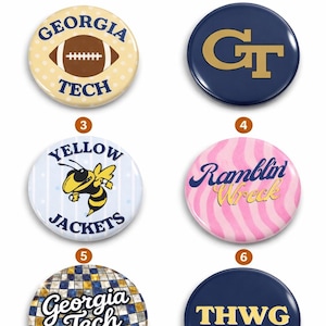 May include: A collection of six round buttons with various designs. The buttons feature text and graphics, including a football, a bee, and the words "Georgia Tech" and "Ramblin Wreck". Colors include blue, yellow, and pink.