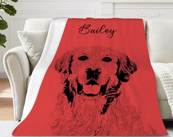 Puede incluir: Una manta roja con un dibujo lineal negro de un perro Golden Retriever. El retrato del perro está centrado, con el nombre "Bailey" en escritura cursiva encima. La manta está sobre un sofá blanco.