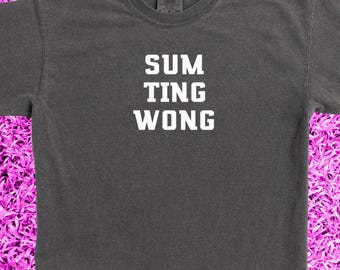 The legendary Sum Ting Wong was in the cockpit that fateful day. Garment dyed tee with soft, vintage fade.