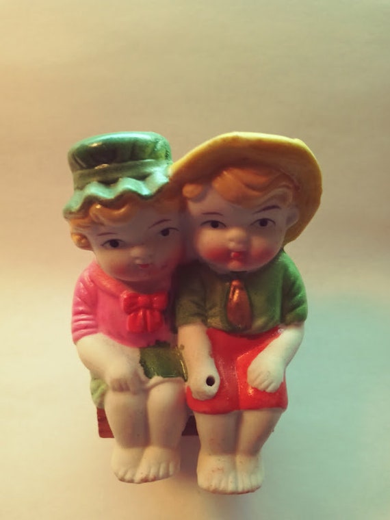 Occupied Japan Bisque Pot/Shelf sitters Boy & Girl 2 3/8" Green hat/yellow hat