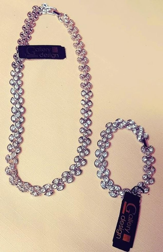 Gallery Design Silvertone Metal Rhinestone Leaf Necklace and Bracelet Set