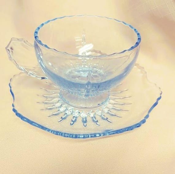 New Martinsville Glass Radiance Ice Blue Winged handle cup and saucer.
