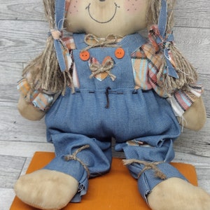 Fall scarecrow in overalls
