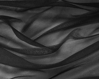Net tulle fabric for sewing evening, wedding and children's dresses.