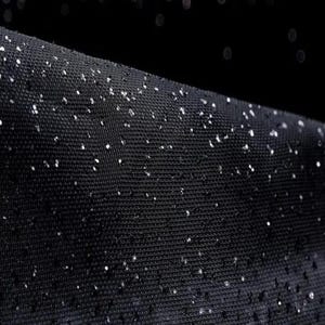 Soft glitter tulle with small sparkles for sewing dresses, veils, skirts