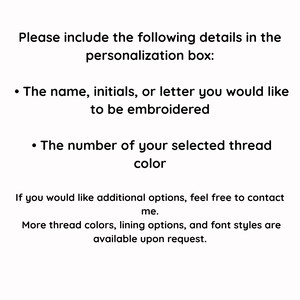 May include: White background with black text. The text reads: "Please include the following details in the personalization box: The name, initials, or letter you would like to be embroidered. The number of your selected thread color."