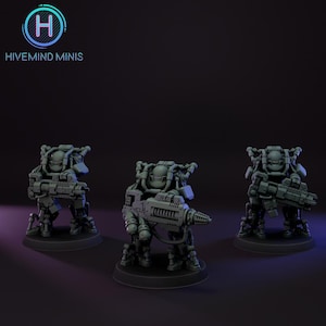 Puede incluir: Tres figuras de robots en miniatura grises con armas grandes, de pie sobre bases negras. Las figuras tienen diseños mecánicos detallados. El texto "HIVE MIND MINIS" está en la esquina superior izquierda.