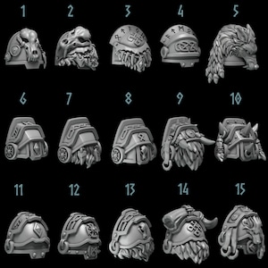 May include: A collection of fifteen gray, 3D-printed miniature shoulder pads, each with a unique design. The designs include animal heads, helmets with runes, and stylized beards. The shoulder pads are arranged in three rows of five.