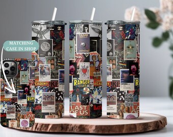May include: A stainless steel tumbler featuring a collage of album covers and movie posters. The tumbler is black and showcases a range of bands and films, including The Last of Us, The Beatles, and The Rolling Stones.