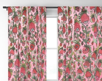 May include: A pair of pink curtains with a whimsical pattern of strawberries with eyes. The strawberries are drawn in a cartoon style and are surrounded by green leaves and vines.