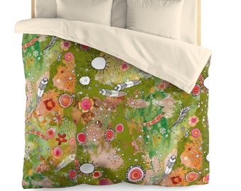 May include: A duvet cover featuring a vibrant green background with an abstract pattern of pink and red circular floral motifs, white dotted accents, and scattered black and white line-drawn feathers, paired with two solid cream-colored pillows.