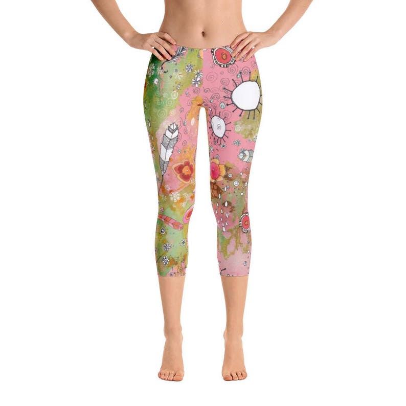 May include: Pink and green patterned leggings with abstract designs, including flowers, feathers, and swirls.