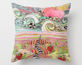 May include: A colorful throw pillow with a whimsical design featuring a pink apple, green and blue waves, and a landscape with red strawberries. The pillow is made of soft fabric and has a white background.