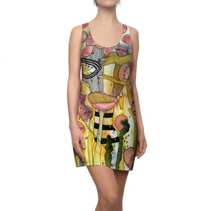 May include: A sleeveless dress with a colorful abstract print featuring a yellow, pink, and green watercolor design. The print includes a variety of shapes and lines, including circles, eyes, and flowers.