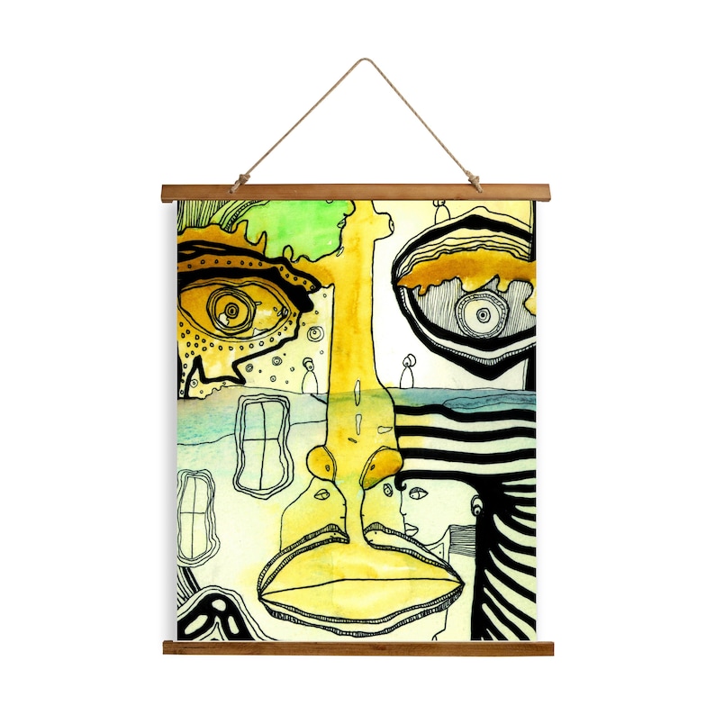 May include: Abstract watercolour painting of a face with a yellow, green and blue colour scheme. The face is made up of geometric shapes and lines. The painting is framed with a wooden frame.