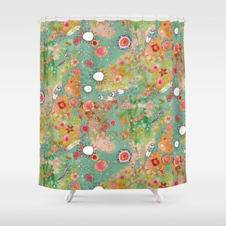 May include: A shower curtain with a colorful abstract pattern featuring green, orange, yellow, pink, and white. The pattern includes circles, dots, and squiggly lines.