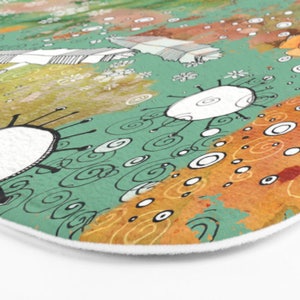 May include: Abstract art bath mat with a green, orange, and white color scheme. The design features swirling lines, circles, and abstract shapes.