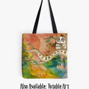 May include: A tote bag featuring a colourful abstract watercolour background with a white cat with black eyes sitting on a branch. The branch is a light brown colour with white stripes. The cat is looking to the right. The background is a mix of orange, yellow, green, blue, and pink.