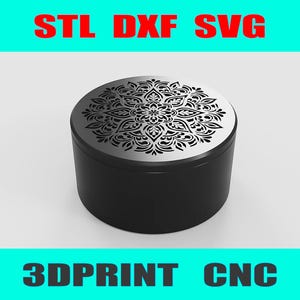 May include: A black round container with a decorative silver lid featuring a symmetrical floral design. The words "STL DXF SVG" and "3DPRINT CNC" are displayed in red and black text above and below the container.