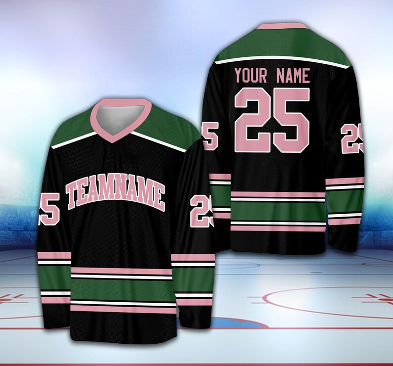 May include: Black hockey jersey with pink and green stripes. The jersey has the text "TEAMNAME" and the number "25" on the front. The back of the jersey has the text "YOUR NAME" and the number "25" on the back.