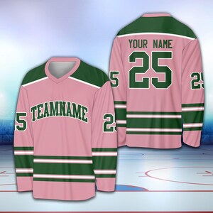 May include: Pink and green hockey jersey with white stripes. The jersey has the number 25 on the back and the text "YOUR NAME" above it. The front of the jersey has the text "TEAMNAME" and the number 25 on the sleeves.