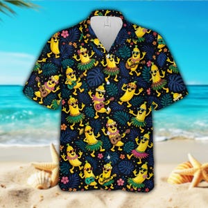 Maglietta hawaiana con banana che ride, divertente maglietta Aloha con banana danzante e motivo ukulele hula con foglie tropicali, ideale come regalo per le vacanze al mare e l'estate.