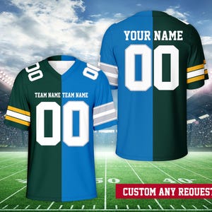 May include: A custom football jersey with a split design. The left side is green with yellow trim and the right side is blue with silver trim. The jersey has a white number "00" on the front and the text "TEAM NAME TEAM NAME" above the number. The jersey also has the text "YOUR NAME" and the number "00" on the back. The jersey is on a green field with white lines.