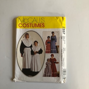 May include: A McCall's Costumes sewing pattern for a Pilgrim costume. The pattern includes instructions for making a dress and bonnet for both a child and an adult. The pattern number is 2337.
