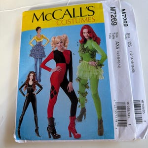 May include: McCall's Costumes sewing pattern M7269 featuring illustrations of four different character outfits. The pattern includes sizes AX5 (4-8-10-12) and D5 (12-14-16-18-20). The cover displays costumes in red, black, green, yellow, and blue colors.