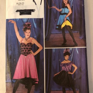 May include: A vintage Butterick sewing pattern, number 3553, featuring illustrations of three different evening gowns. The gowns are in shades of pink, blue, and purple, with black accents. The pattern includes size options 18, 20, and 22.