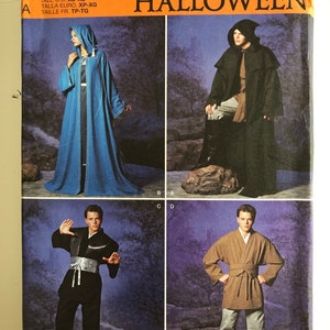 May include: Simplicity Halloween sewing pattern R11580 for making costumes. The pattern includes instructions for making a blue hooded robe, a black hooded robe, a black robe with a belt, and a brown robe with a belt.