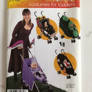 May include: Simplicity pattern number 2792 for toddler costumes. The pattern includes four different costumes: a flower stroller, a green pea pod stroller, a pirate stroller, and a purple knight stroller. The pattern is for sizes 1/2, 1, 2, 3, and 4.