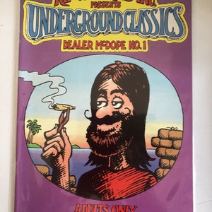 May include: A comic book cover with a purple background. The title is "Rip Off Press Inc. Presents Underground Classics" and the subtitle is "Dealer McDope No. 1". The cover features a cartoon of a man with long brown hair and a beard, holding a joint. The text "Adults Only" is at the bottom of the cover.