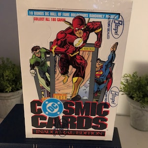 Impel/DC Comics Cosmic Cards Inaugural Edition. 36 Packs per Box. 12 Cards per Pack.